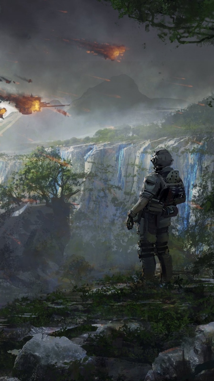 Mann in Schwarzer Jacke Und Schwarzer Hose, Der Auf Felsigem Boden Steht. Wallpaper in 720x1280 Resolution