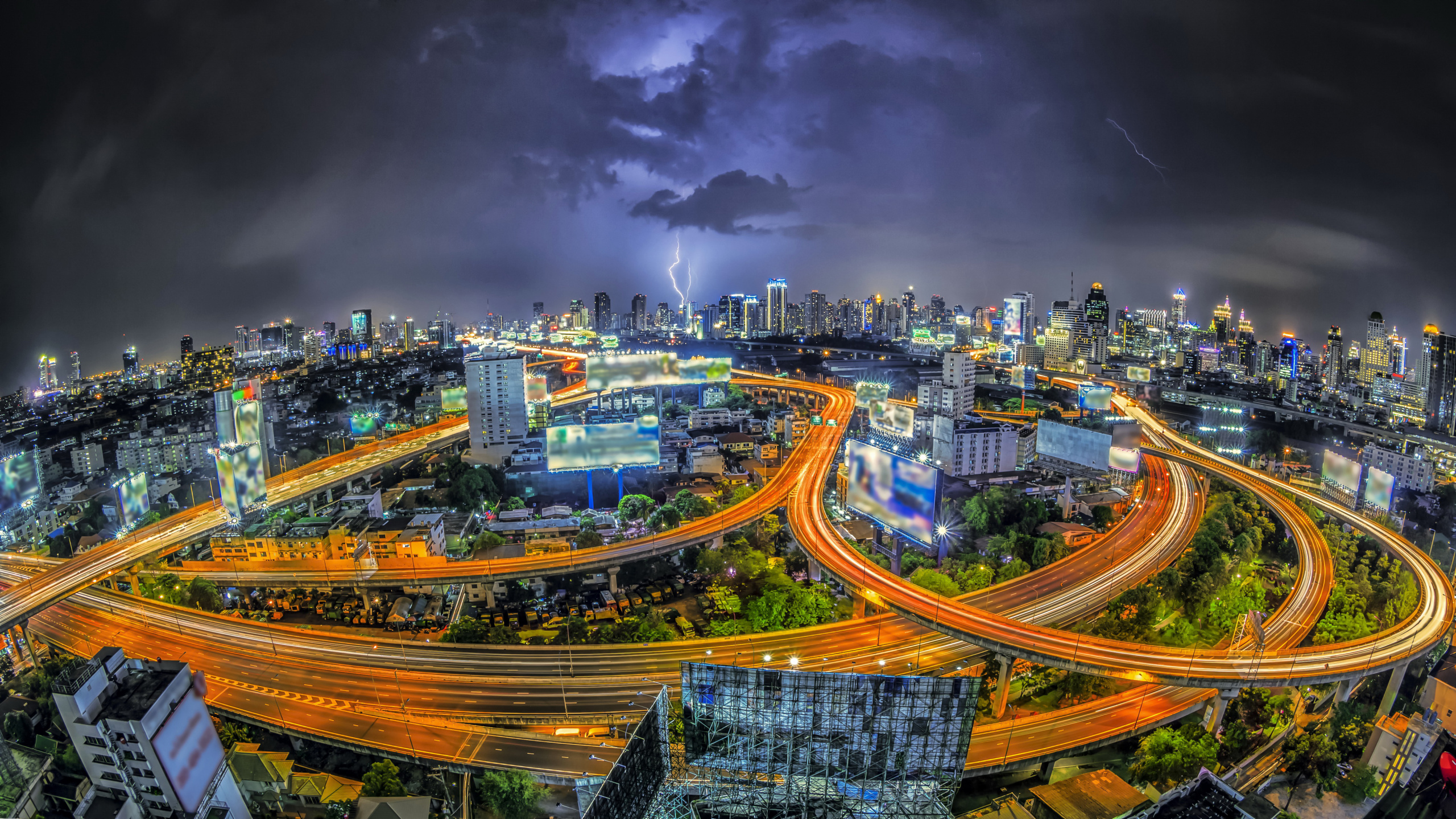 City With High Rise Buildings During Night Time. Wallpaper in 2560x1440 Resolution