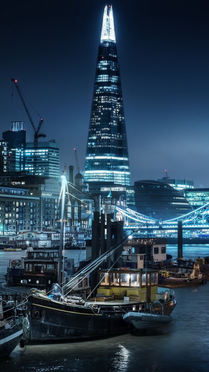 Black and White Boat on Body of Water During Night Time. Wallpaper in 720x1280 Resolution