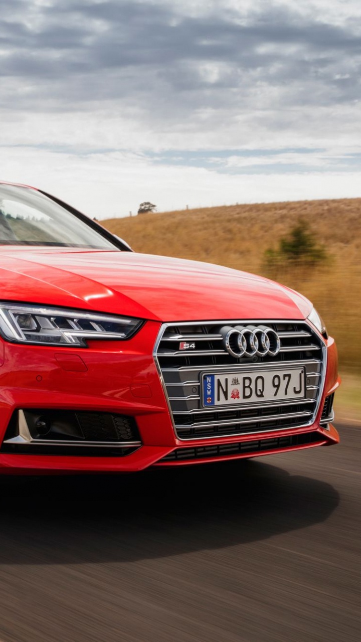 Red Audi Coupe on Road During Daytime. Wallpaper in 720x1280 Resolution
