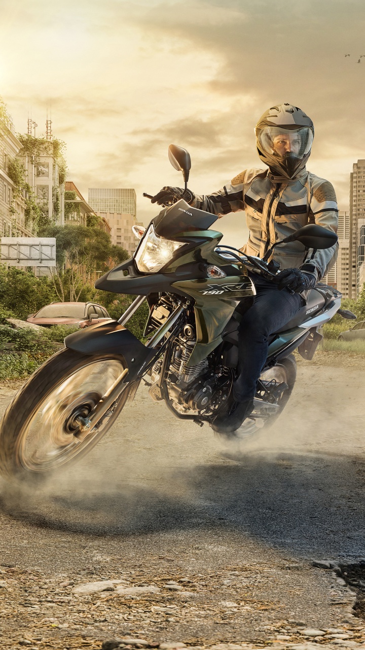 Man in Black Jacket Riding on Black Motorcycle. Wallpaper in 720x1280 Resolution