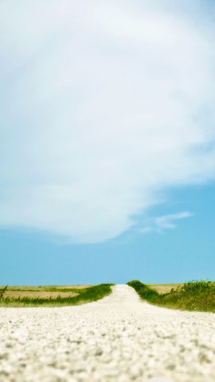 Green Grass Field Under Blue Sky During Daytime. Wallpaper in 720x1280 Resolution