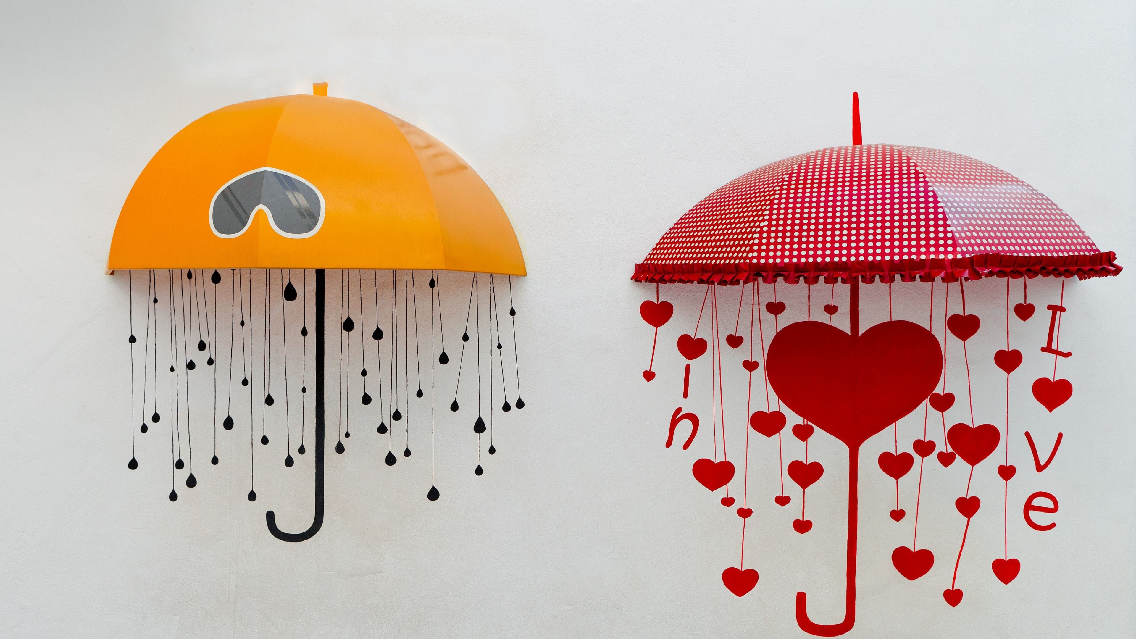 Red and Yellow Umbrella With White Background. Wallpaper in 3840x2160 Resolution