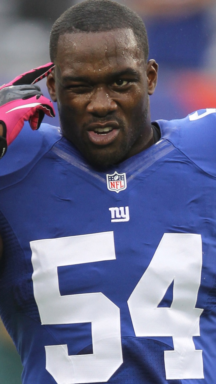 Mann im Blau-roten Nike-Jersey-Shirt. Wallpaper in 720x1280 Resolution