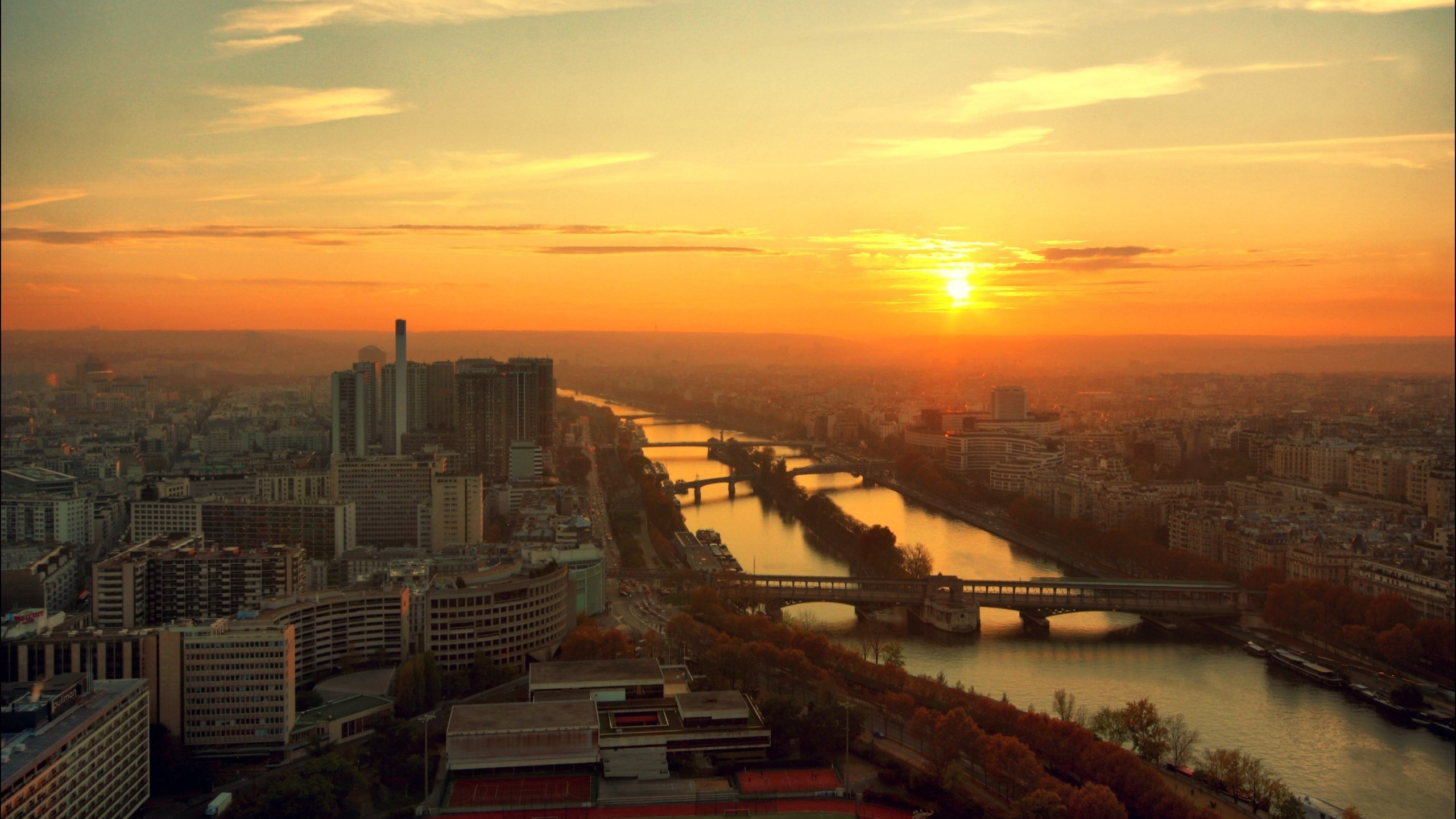 Aerial View of City Buildings During Sunset. Wallpaper in 2560x1440 Resolution
