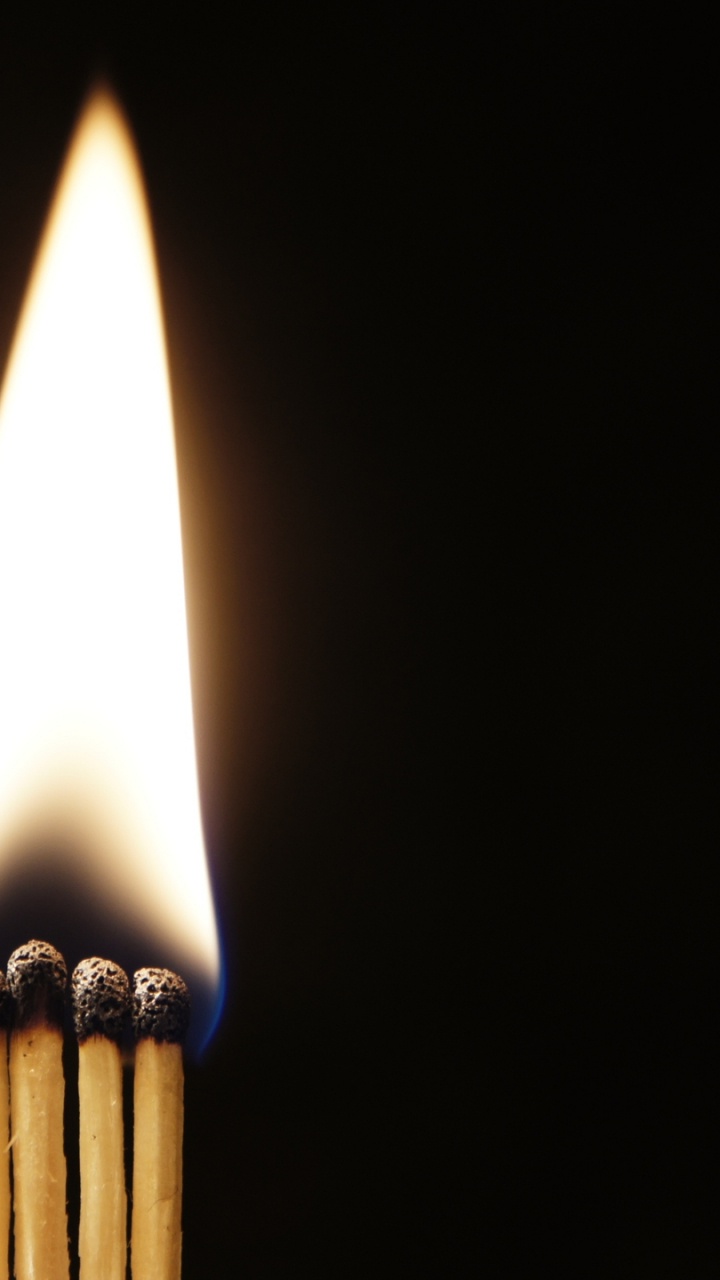 Lighted Candle in Black Background. Wallpaper in 720x1280 Resolution