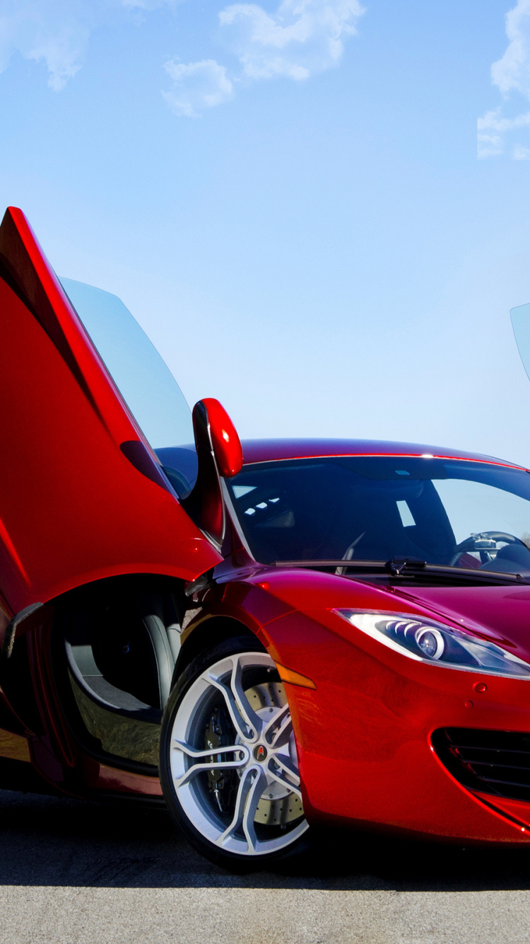 Red Ferrari 458 Italia on Road During Daytime. Wallpaper in 750x1334 Resolution