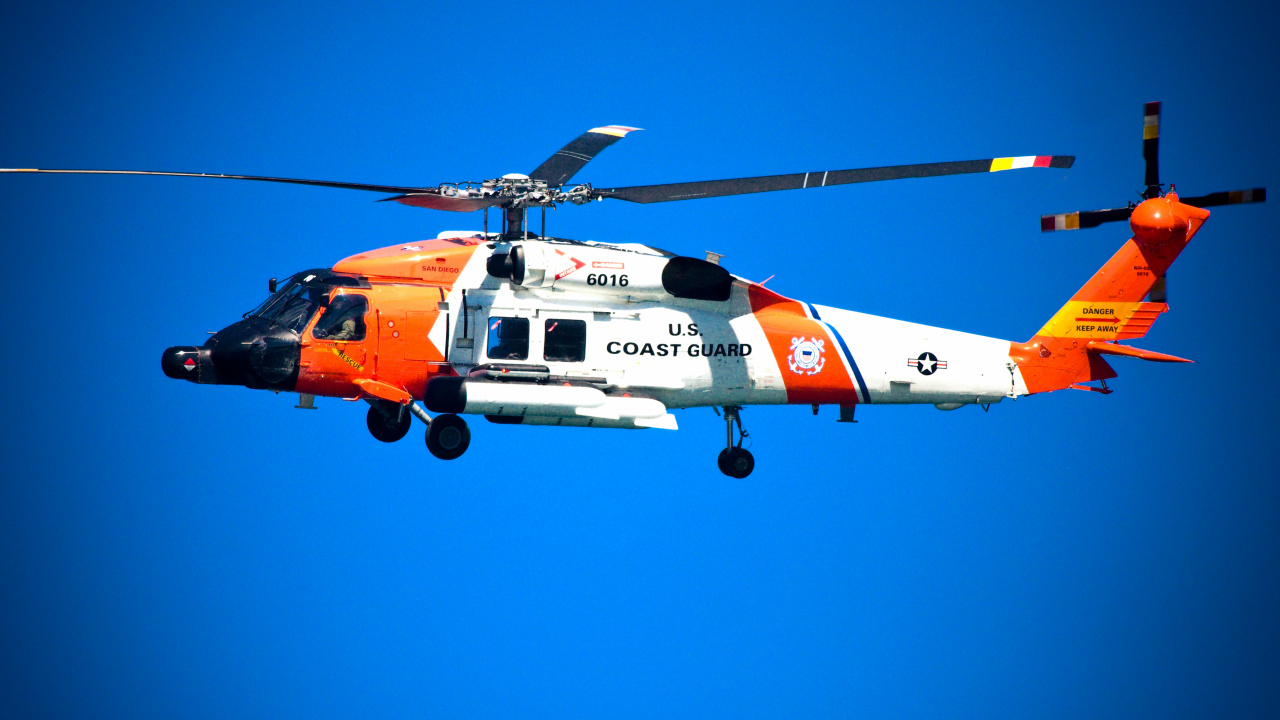 Orange and White Helicopter Flying in The Sky During Daytime. Wallpaper in 1280x720 Resolution