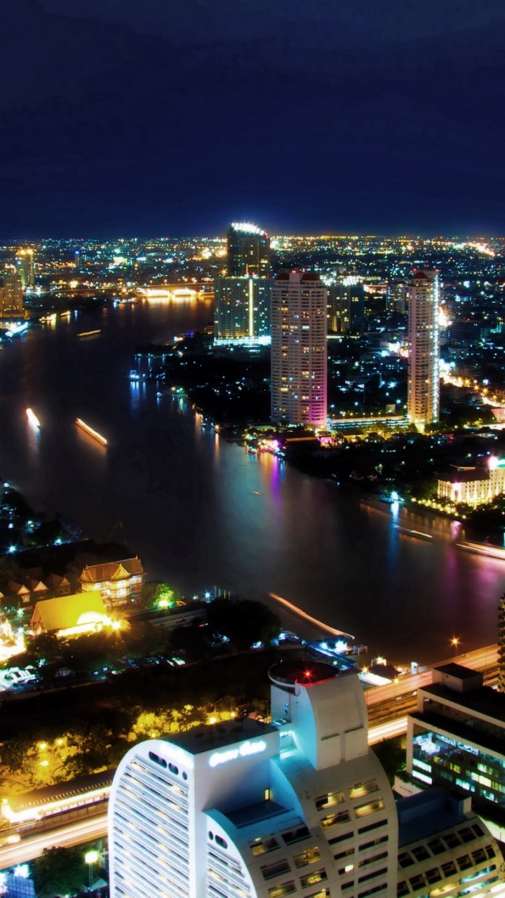 Horizonte de la Ciudad Durante la Noche. Wallpaper in 720x1280 Resolution