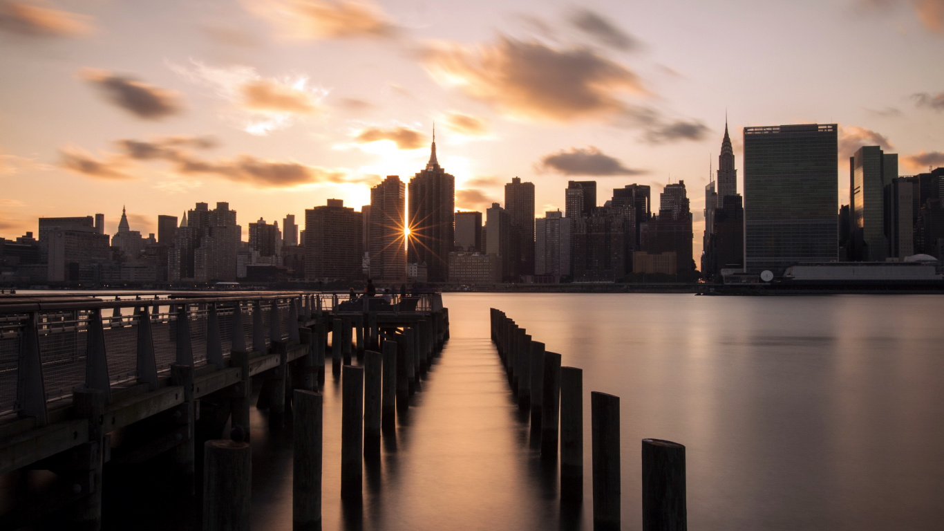 Brown Wooden Dock on Body of Water During Daytime. Wallpaper in 1366x768 Resolution
