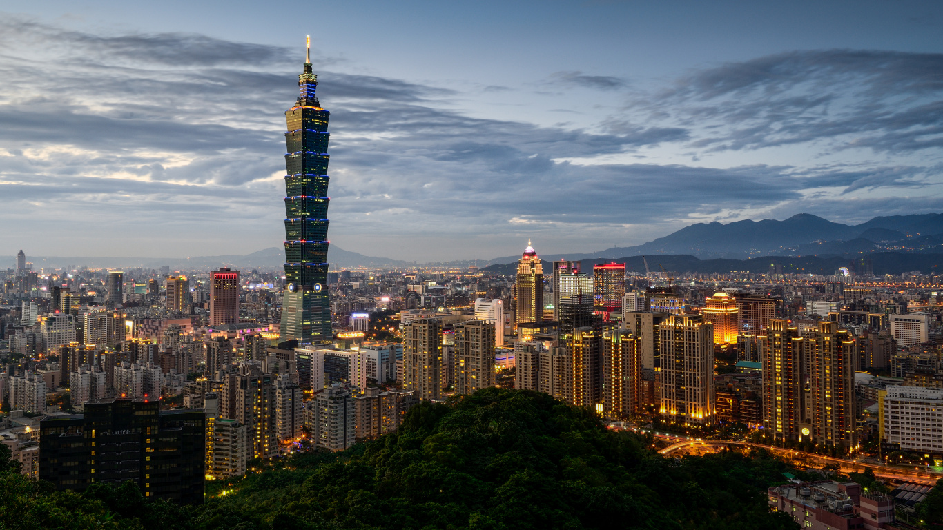 City Skyline Under Blue Sky During Night Time. Wallpaper in 1366x768 Resolution