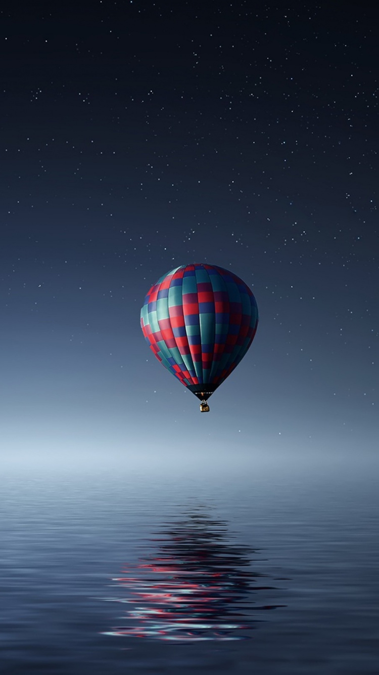 Montgolfière Rouge Bleu et Vert Sous la Nuit Étoilée. Wallpaper in 750x1334 Resolution