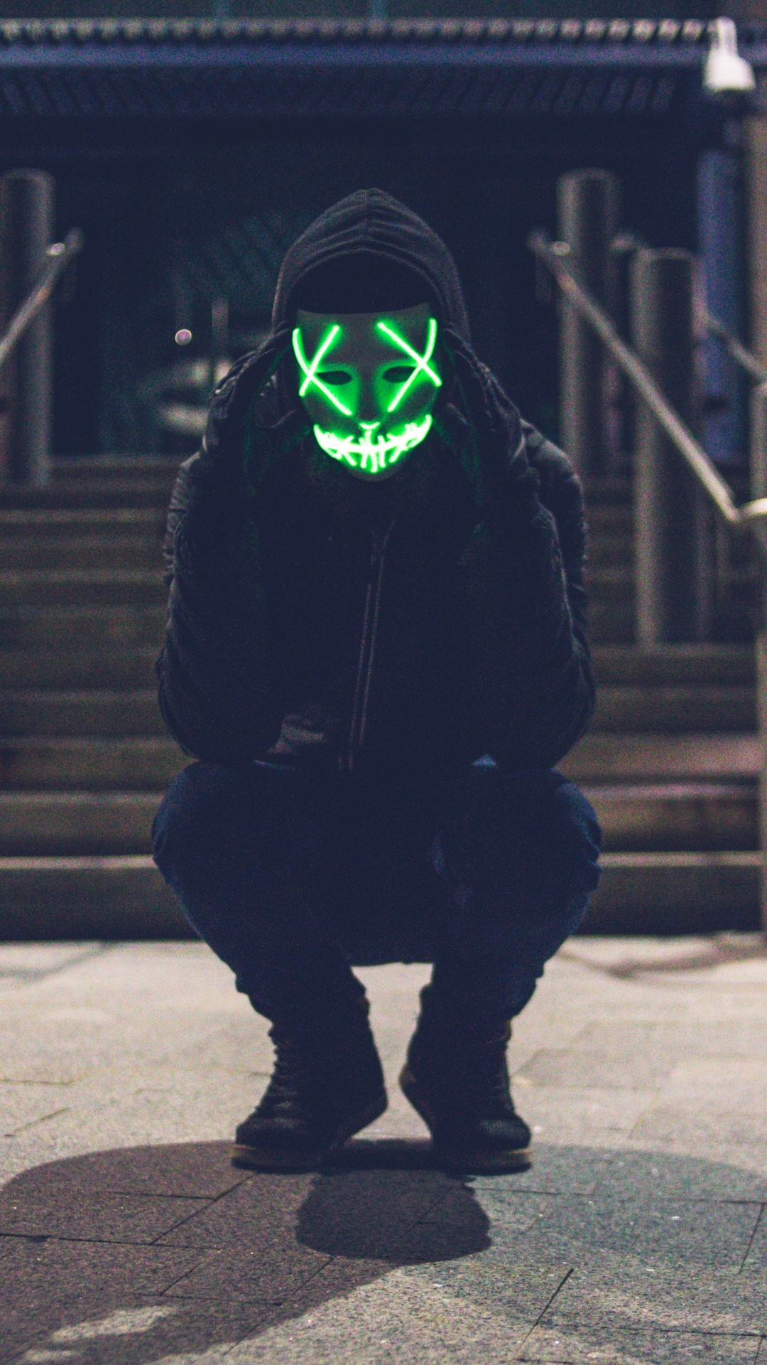 Person in Black Hoodie Wearing Green Mask. Wallpaper in 1080x1920 Resolution