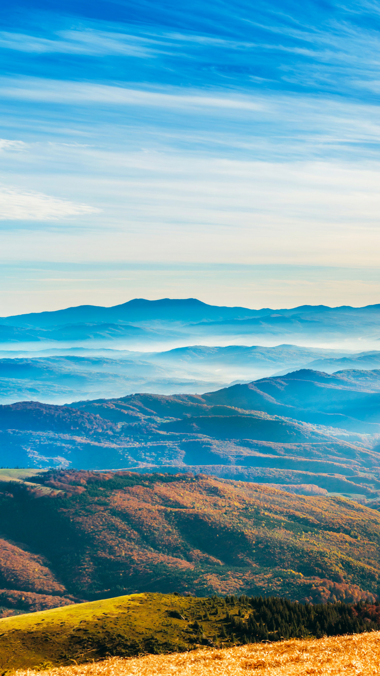 Brown and Green Mountains Under White Clouds and Blue Sky During Daytime. Wallpaper in 750x1334 Resolution