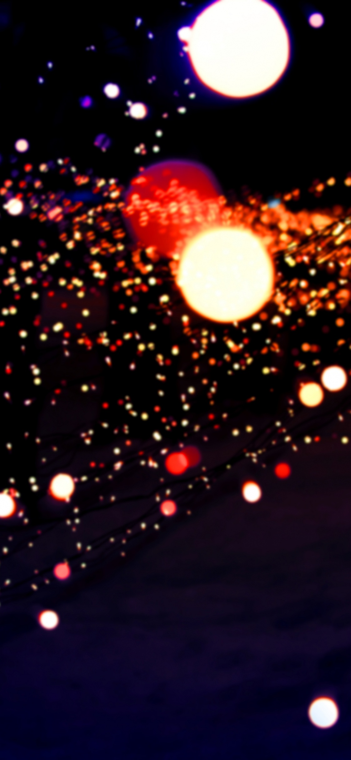 Lila Und Gelbe Lichter Auf Der Straße Während Der Nachtzeit. Wallpaper in 1125x2436 Resolution