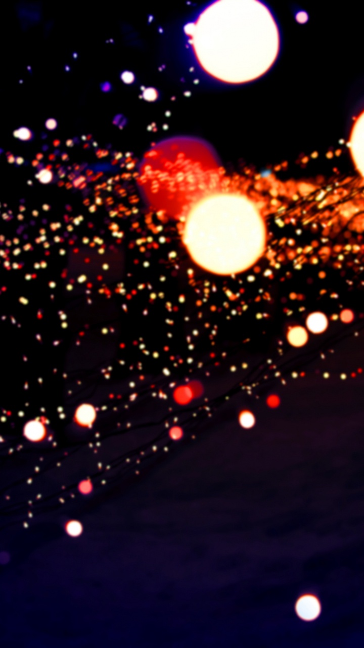 Lila Und Gelbe Lichter Auf Der Straße Während Der Nachtzeit. Wallpaper in 720x1280 Resolution