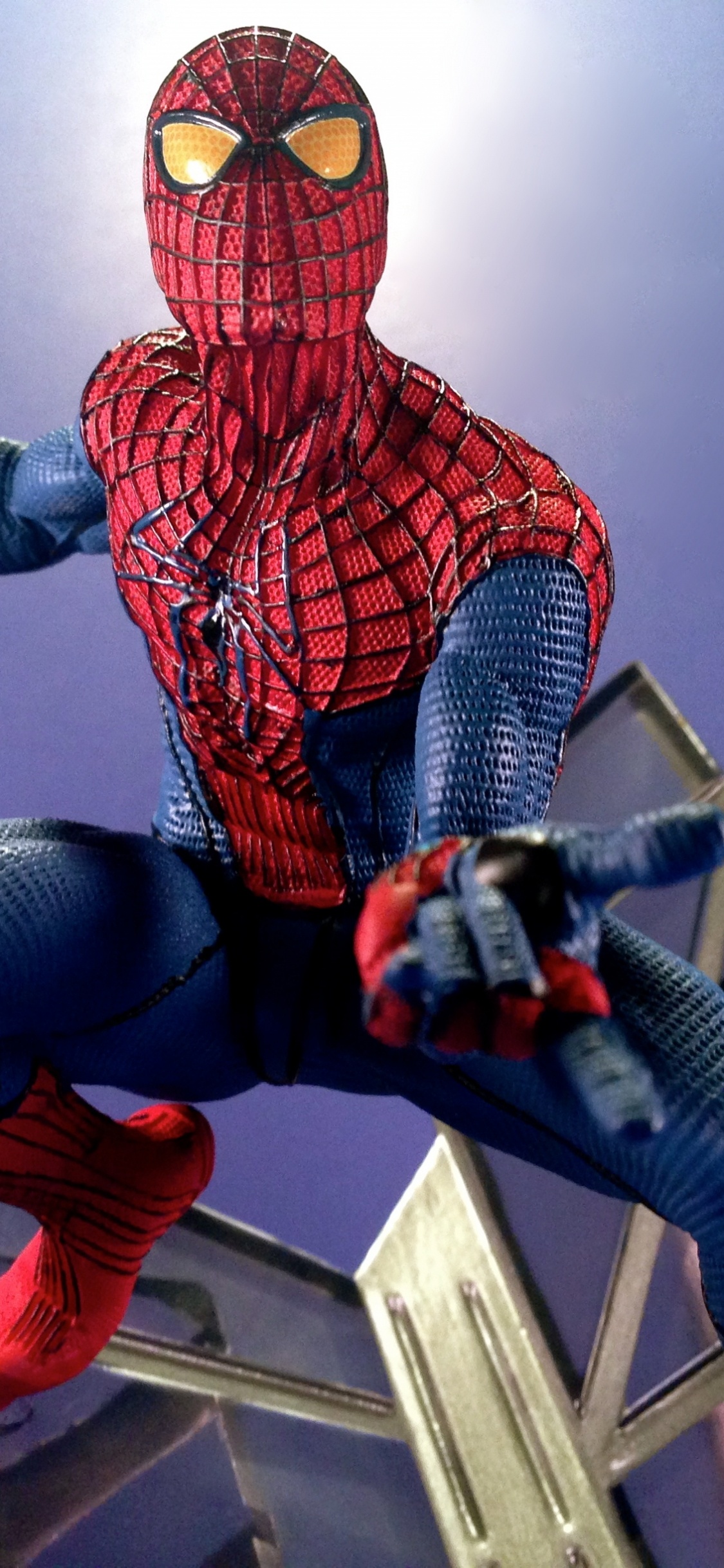 Spider Man on The Edge of a Building. Wallpaper in 1125x2436 Resolution