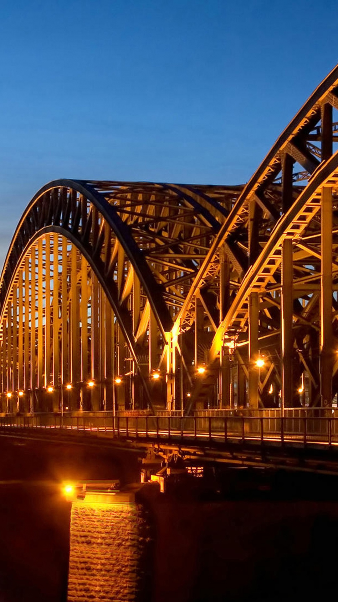 Bridge Over Water During Night Time. Wallpaper in 1080x1920 Resolution