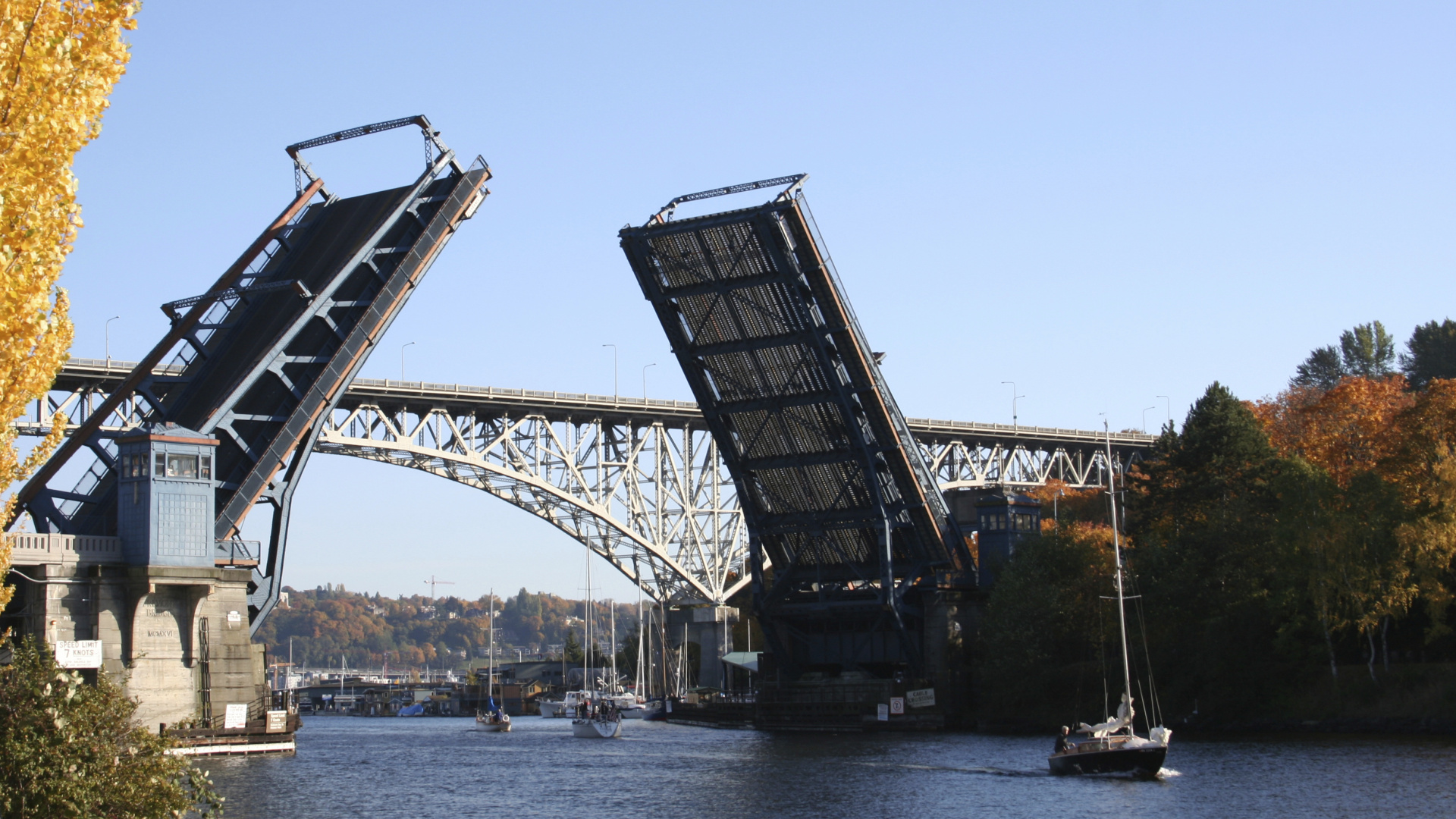 Gray Steel Bridge Over Body of Water During Daytime. Wallpaper in 1920x1080 Resolution
