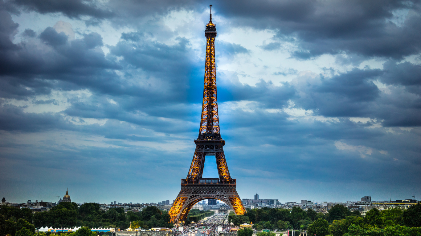 Eiffel Tower Under Cloudy Sky During Daytime. Wallpaper in 1366x768 Resolution