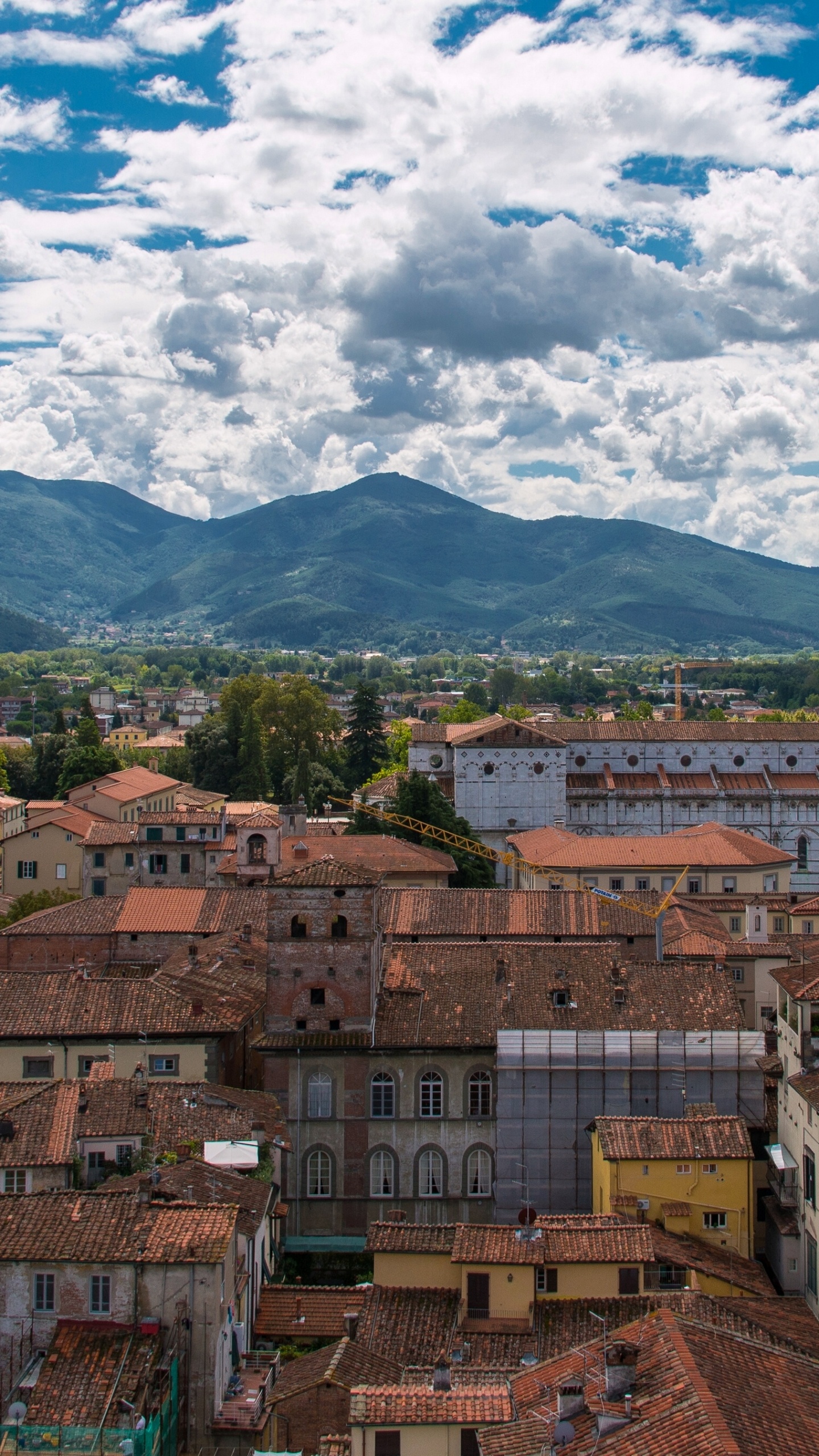 Brown Concrete Buildings Under White Clouds and Blue Sky During Daytime. Wallpaper in 1440x2560 Resolution