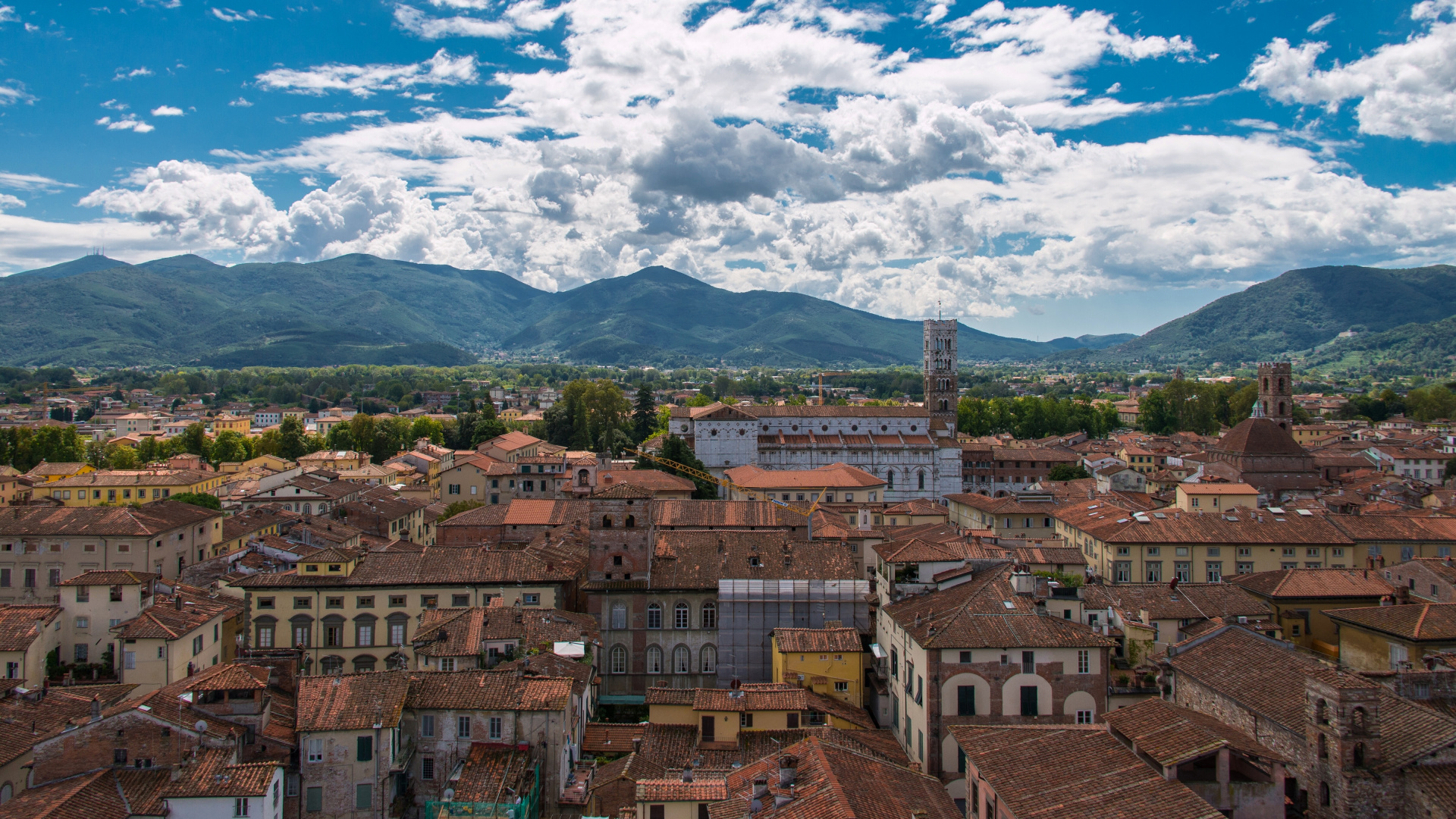 Brown Concrete Buildings Under White Clouds and Blue Sky During Daytime. Wallpaper in 1920x1080 Resolution