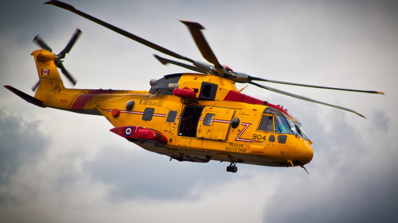Yellow and Red Helicopter Flying in The Sky. Wallpaper in 1366x768 Resolution