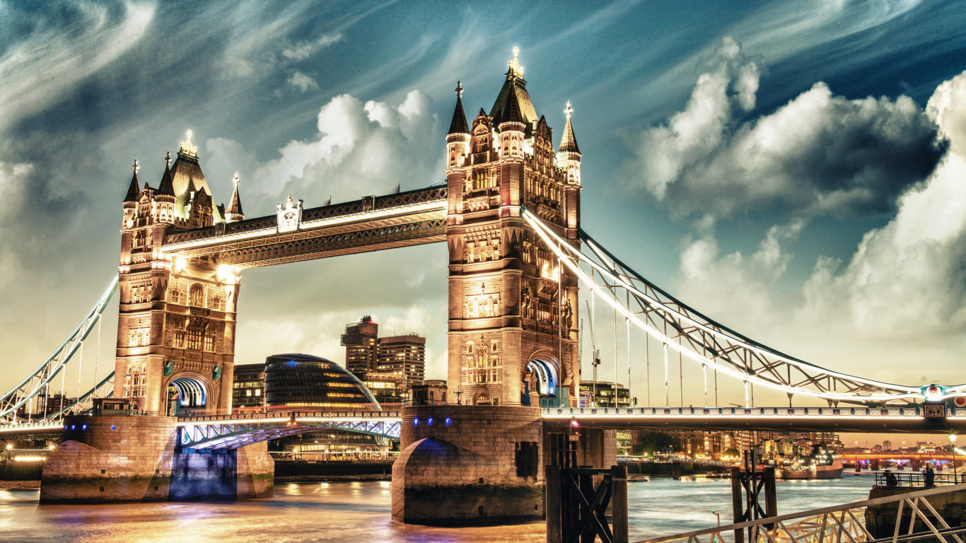 Brown Bridge Under Blue Sky During Night Time. Wallpaper in 1366x768 Resolution