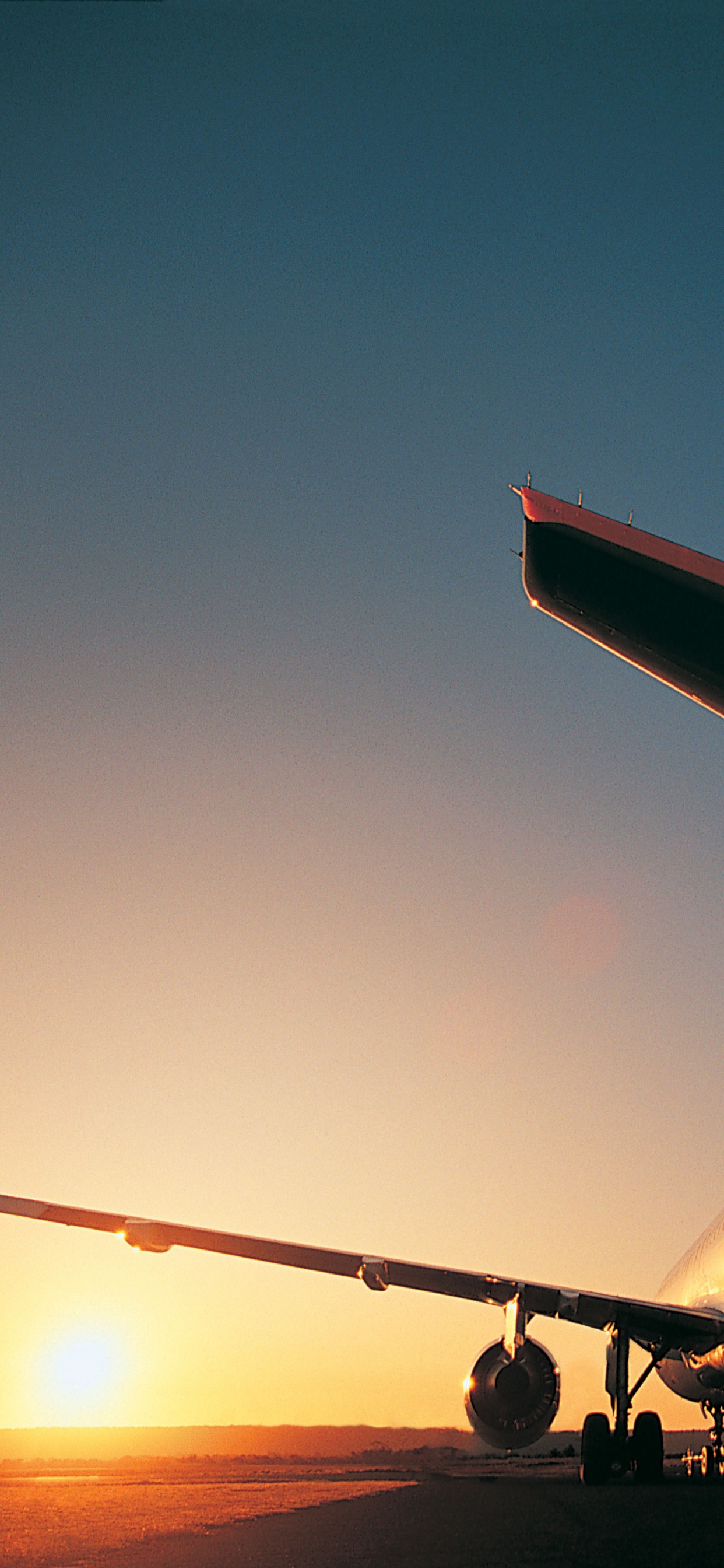 White and Red Airplane on Mid Air During Daytime. Wallpaper in 1242x2688 Resolution