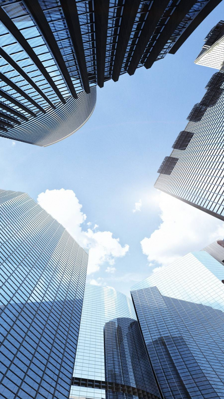 Würmer Blick Auf Hochhäuser Tagsüber. Wallpaper in 750x1334 Resolution