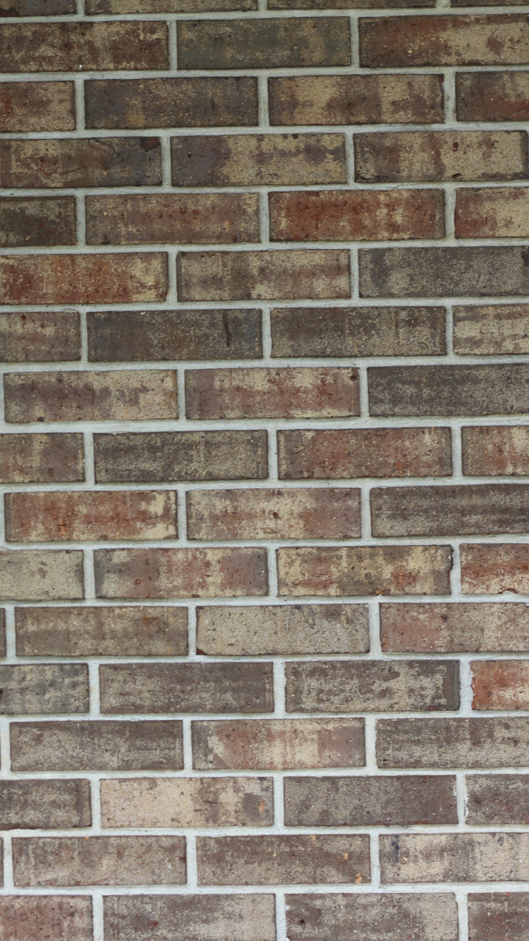 Braune Und Schwarze Mauer. Wallpaper in 750x1334 Resolution