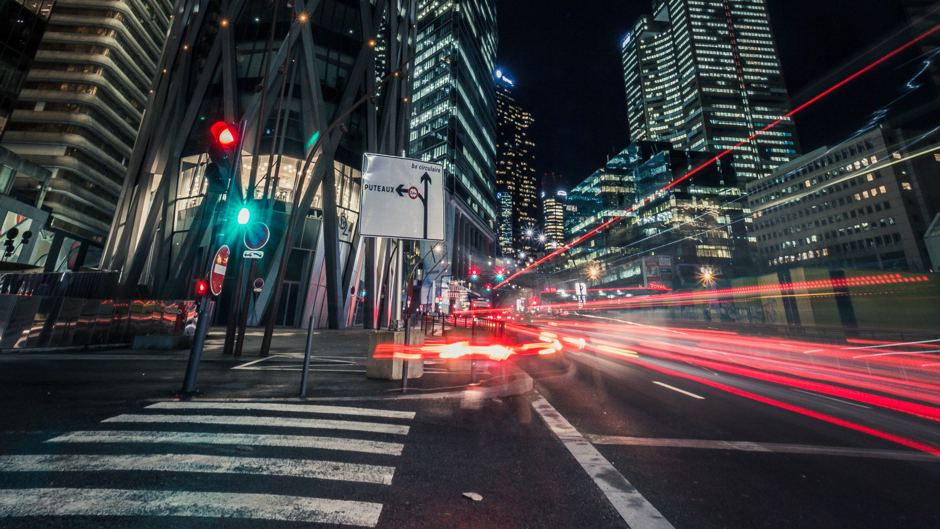 Cars on Road Near High Rise Building During Night Time. Wallpaper in 1920x1080 Resolution