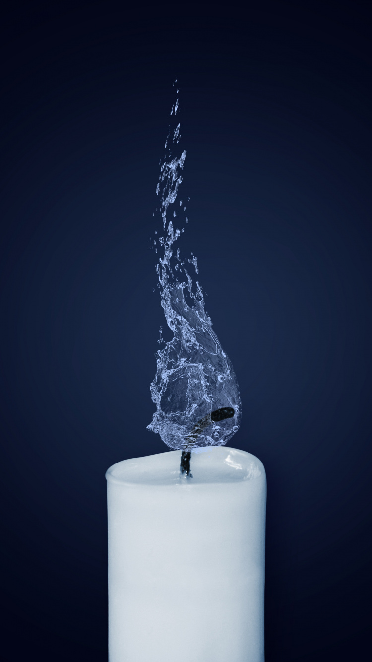 White Pillar Candle on Black Surface. Wallpaper in 750x1334 Resolution