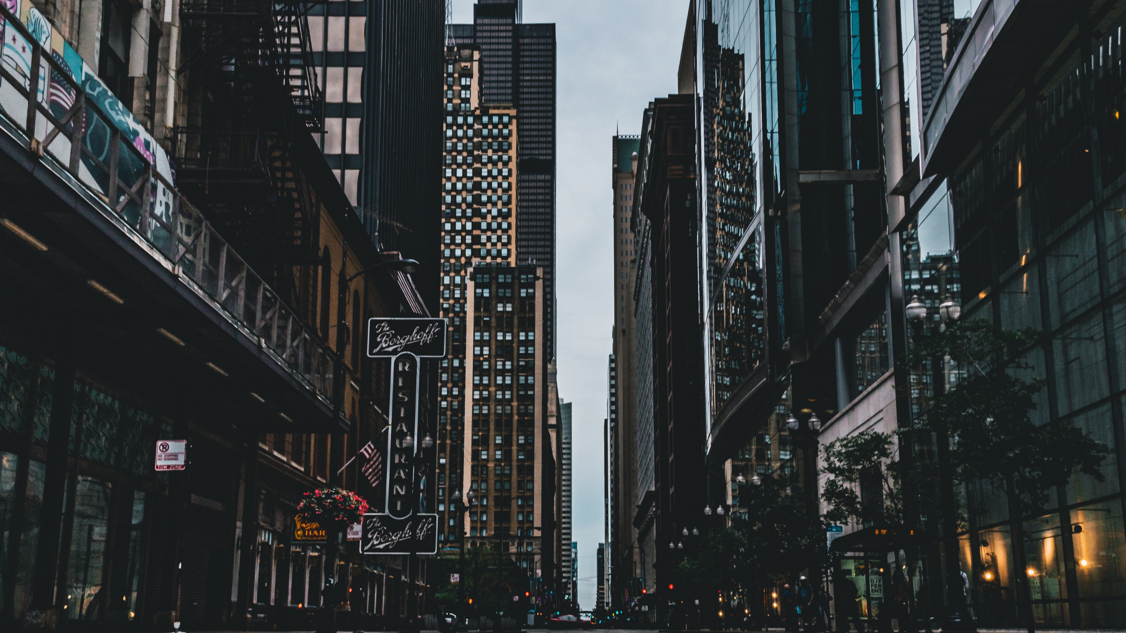 Gray Concrete Road Between High Rise Buildings During Daytime. Wallpaper in 3840x2160 Resolution