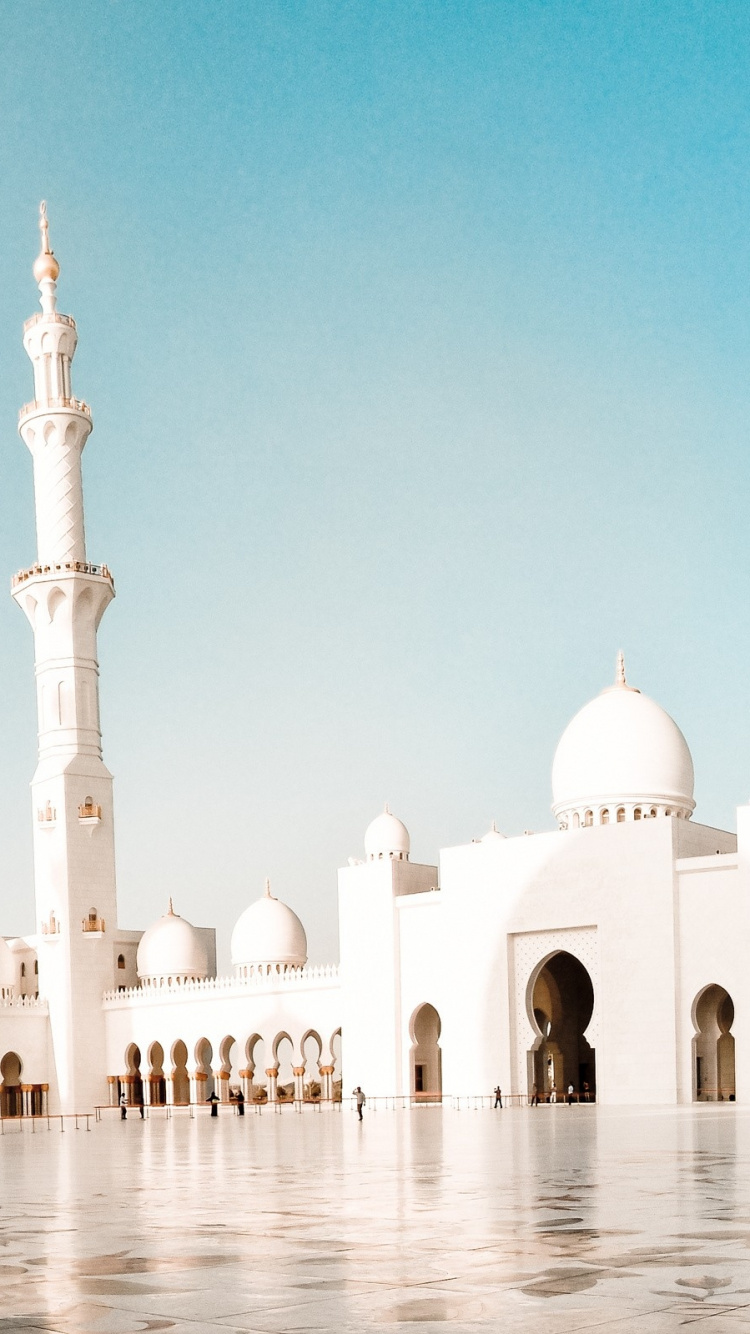 White Concrete Building Under Blue Sky During Daytime. Wallpaper in 750x1334 Resolution