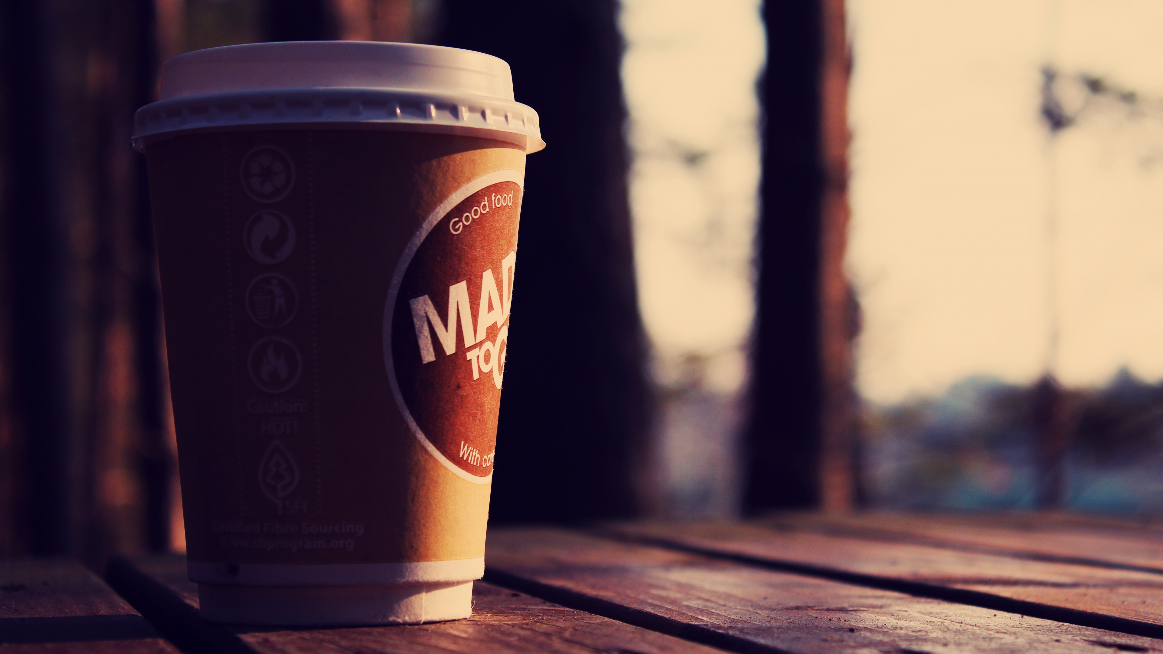 Brown and White Disposable Cup on Brown Wooden Table. Wallpaper in 3840x2160 Resolution