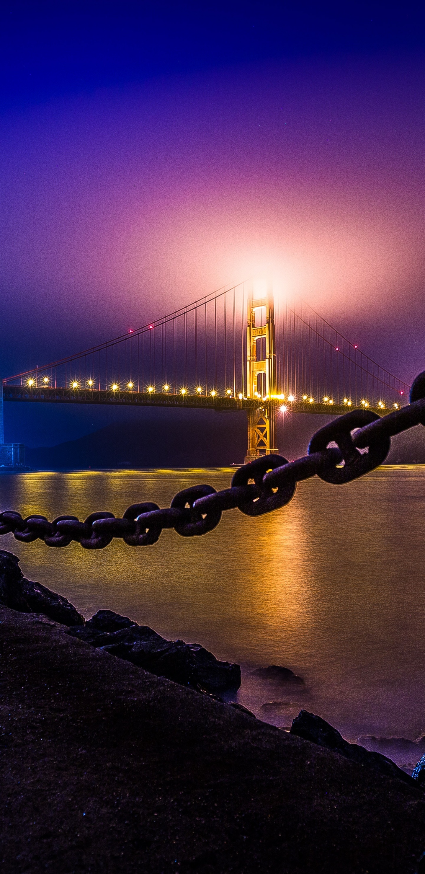 People Walking on Bridge During Night Time. Wallpaper in 1440x2960 Resolution