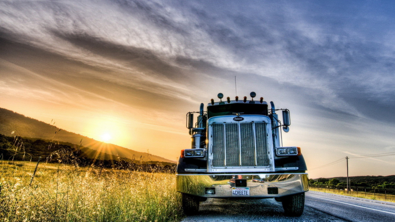 Blue and White Truck on Brown Grass Field During Sunset. Wallpaper in 1280x720 Resolution
