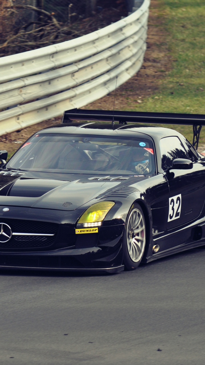 Schwarzer Porsche 911 Tagsüber Auf Parkplatz Geparkt. Wallpaper in 720x1280 Resolution