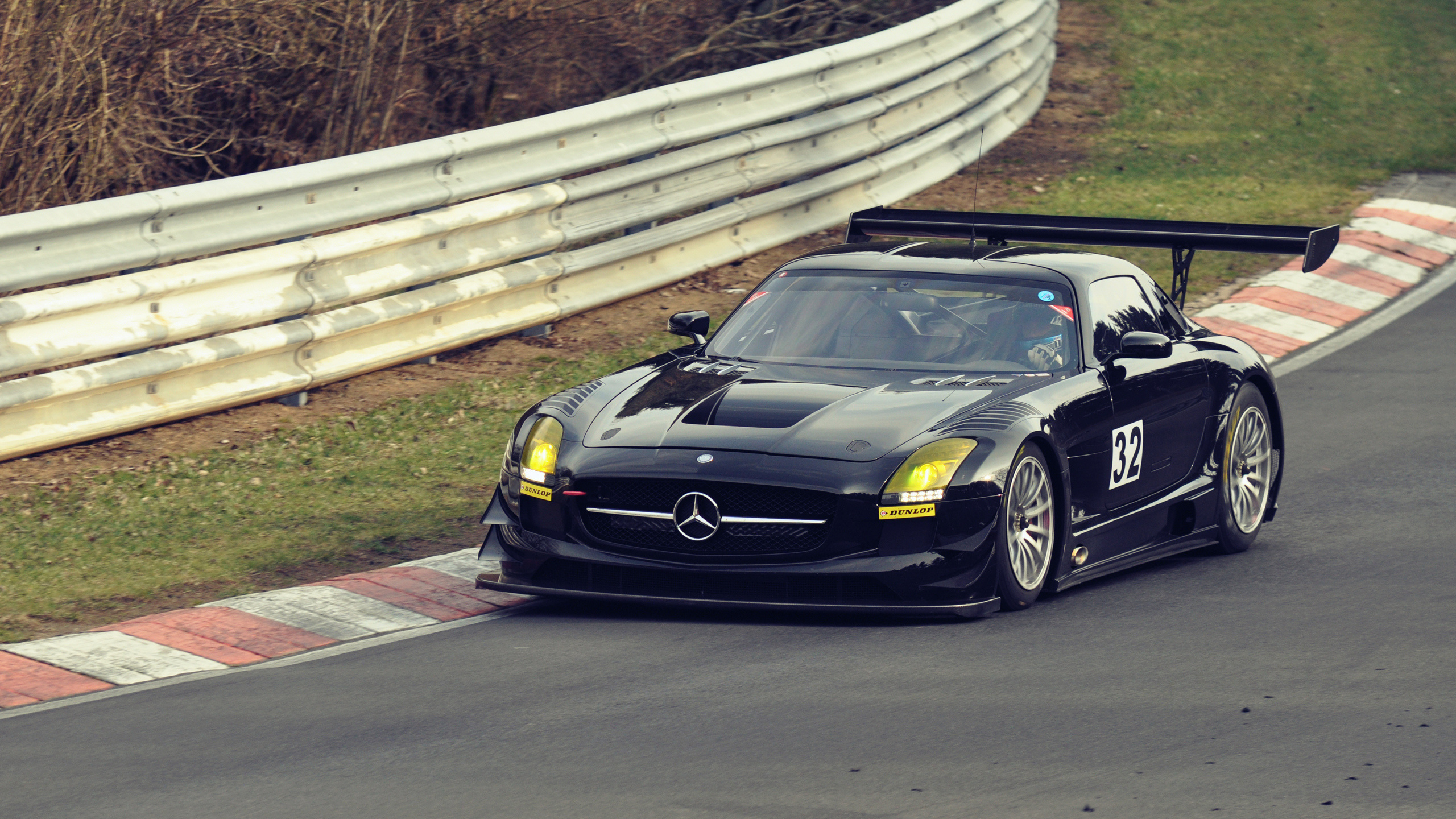 Black Porsche 911 Parked on Parking Lot During Daytime. Wallpaper in 2560x1440 Resolution