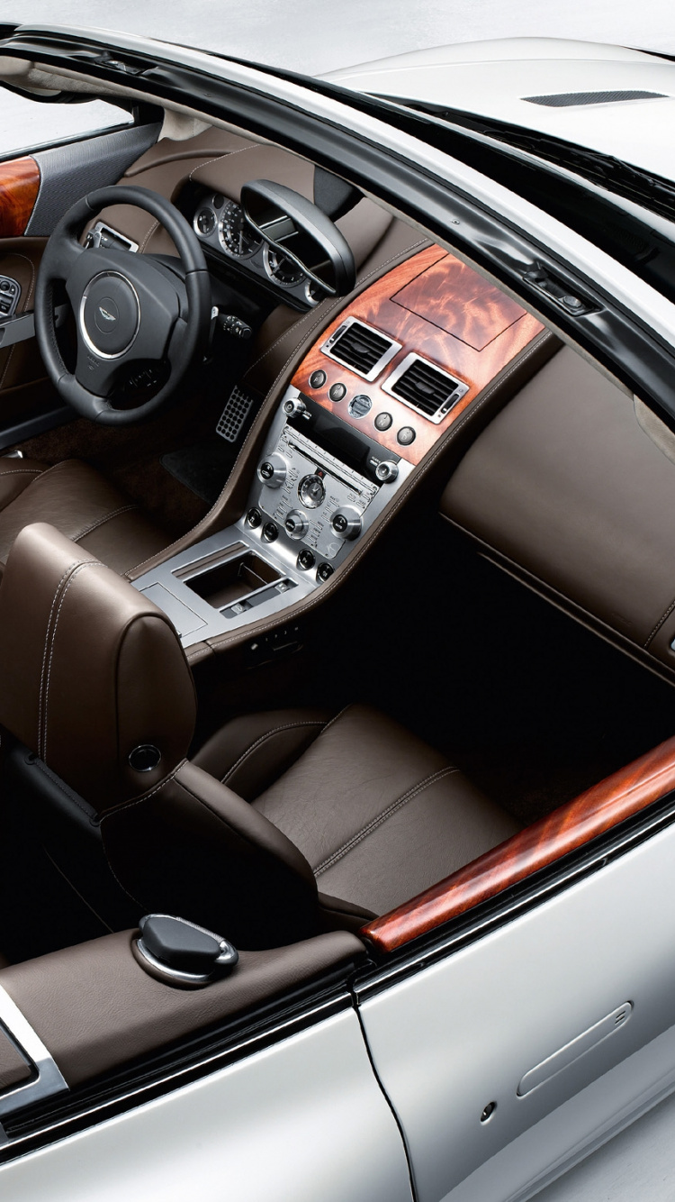 Coche Convertible Marrón y Negro. Wallpaper in 750x1334 Resolution