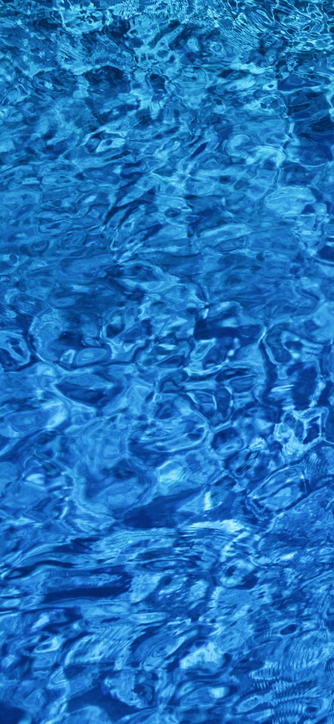 Plan D'eau Bleu Pendant la Journée. Wallpaper in 1125x2436 Resolution