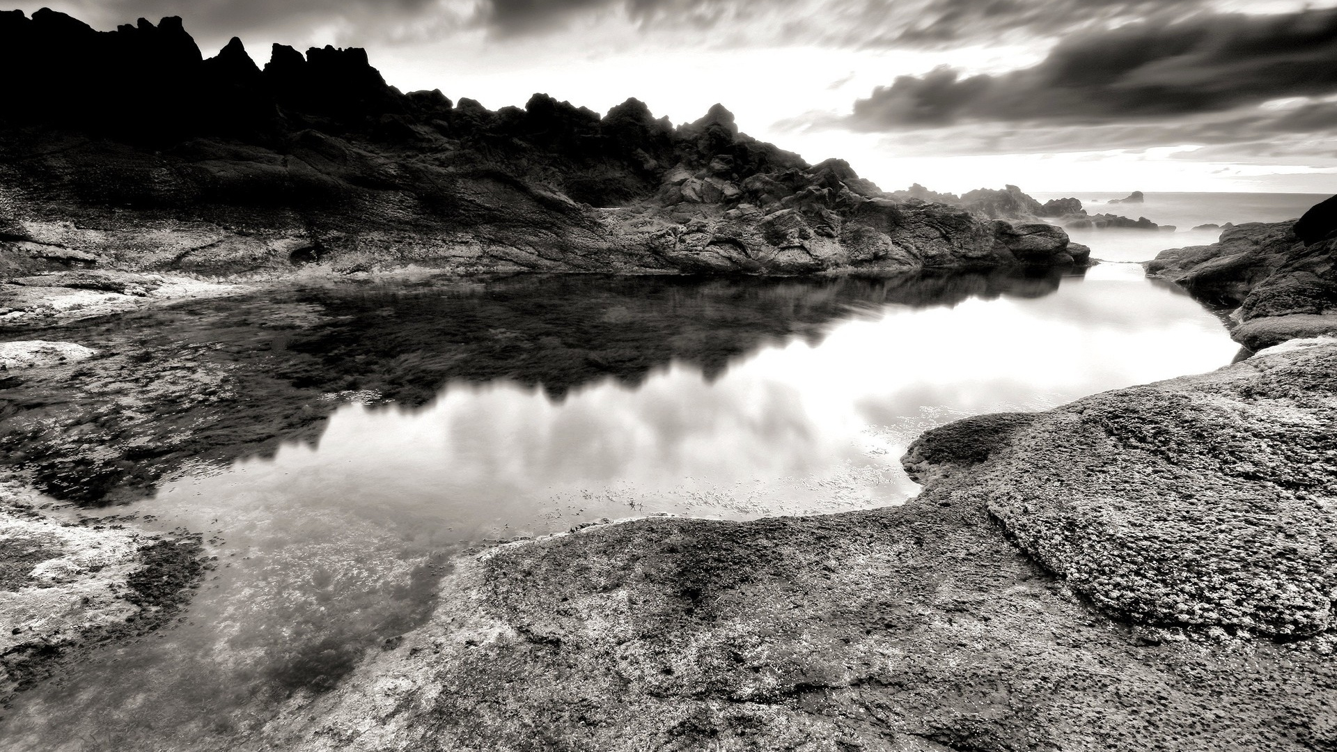 Grayscale Photo of Lake Near Mountain. Wallpaper in 1920x1080 Resolution