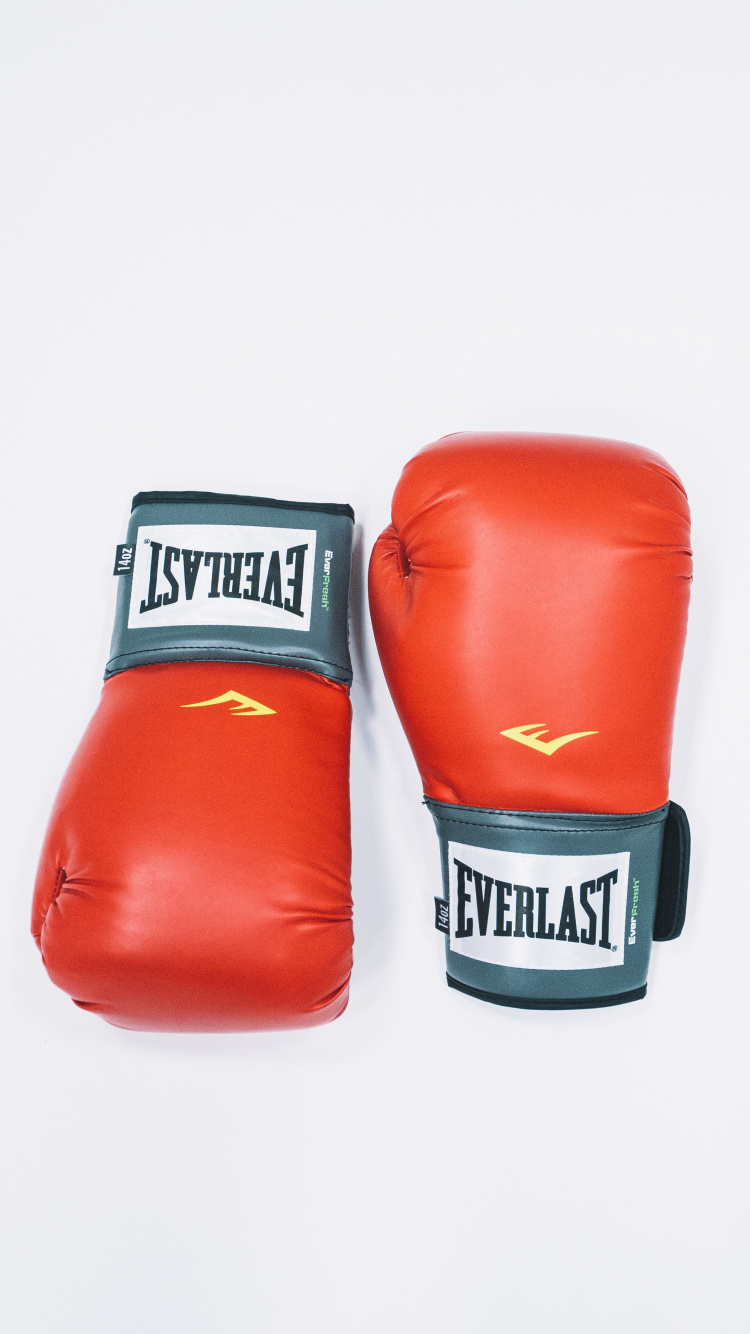 Red and Black Boxing Gloves. Wallpaper in 750x1334 Resolution