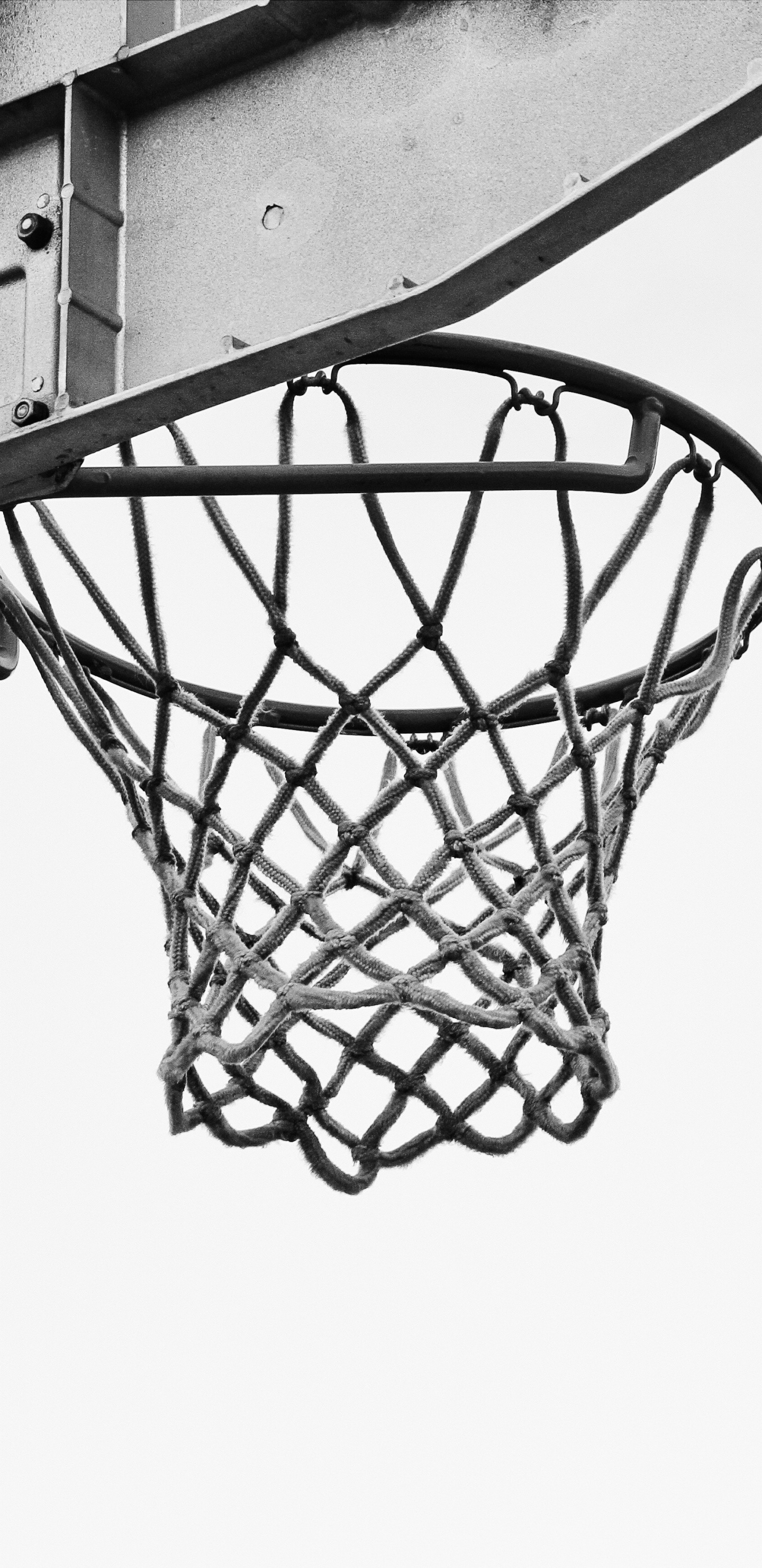 Basketball on Basketball Hoop in Grayscale Photography. Wallpaper in 1440x2960 Resolution