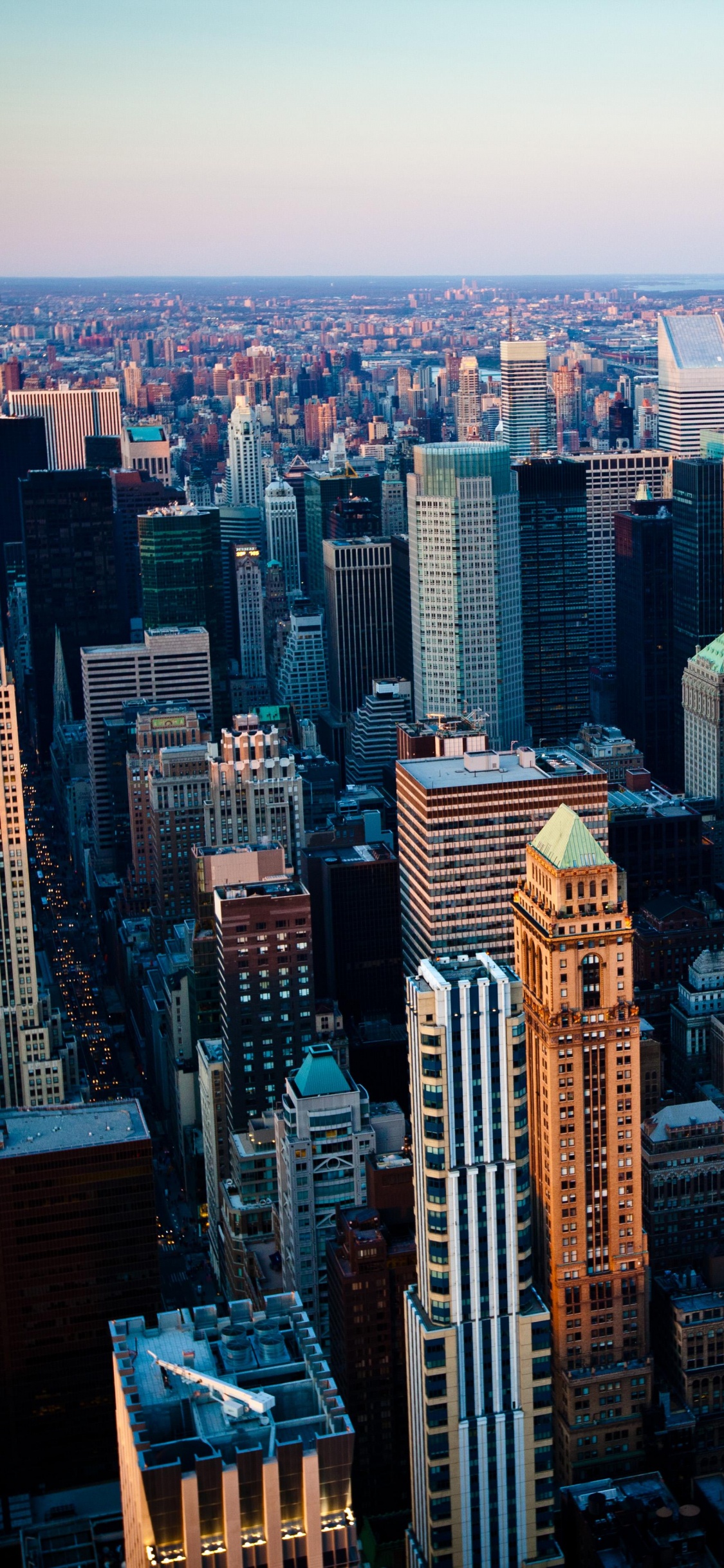 Aerial View of City Buildings During Daytime. Wallpaper in 1125x2436 Resolution