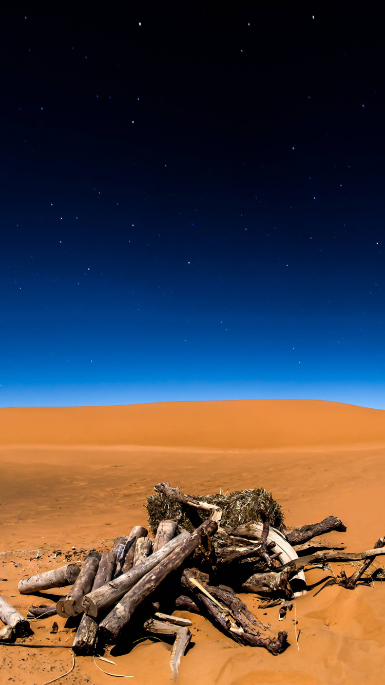 Brown Sand Under Blue Sky During Daytime. Wallpaper in 750x1334 Resolution