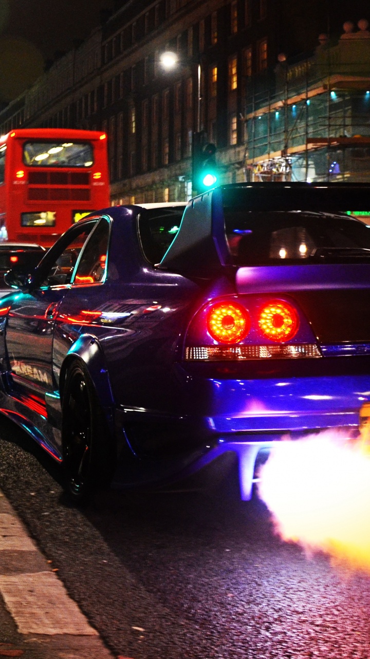 Black Car on Road During Night Time. Wallpaper in 720x1280 Resolution