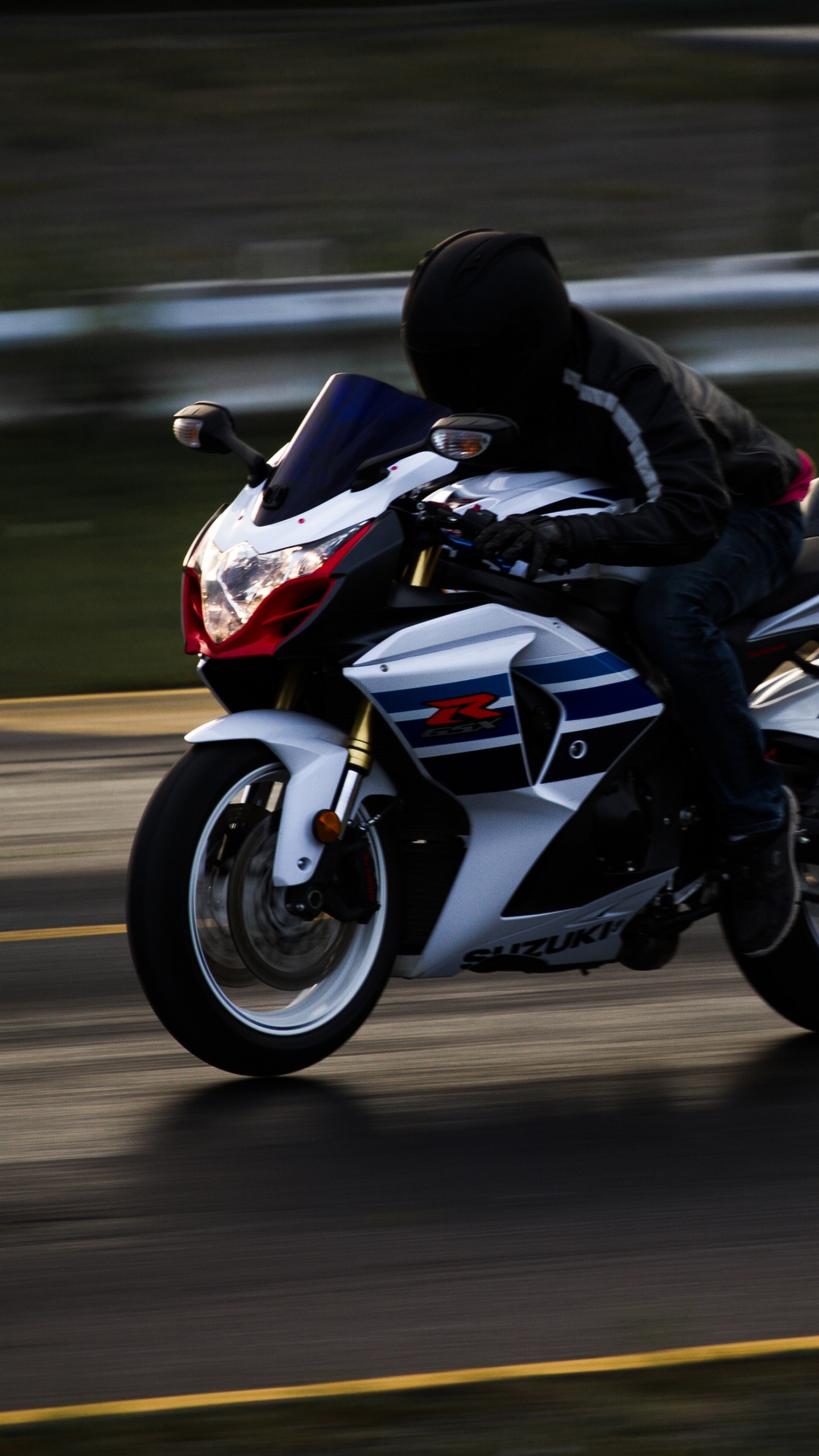 Man in Black Jacket Riding Blue and White Sports Bike. Wallpaper in 1440x2560 Resolution