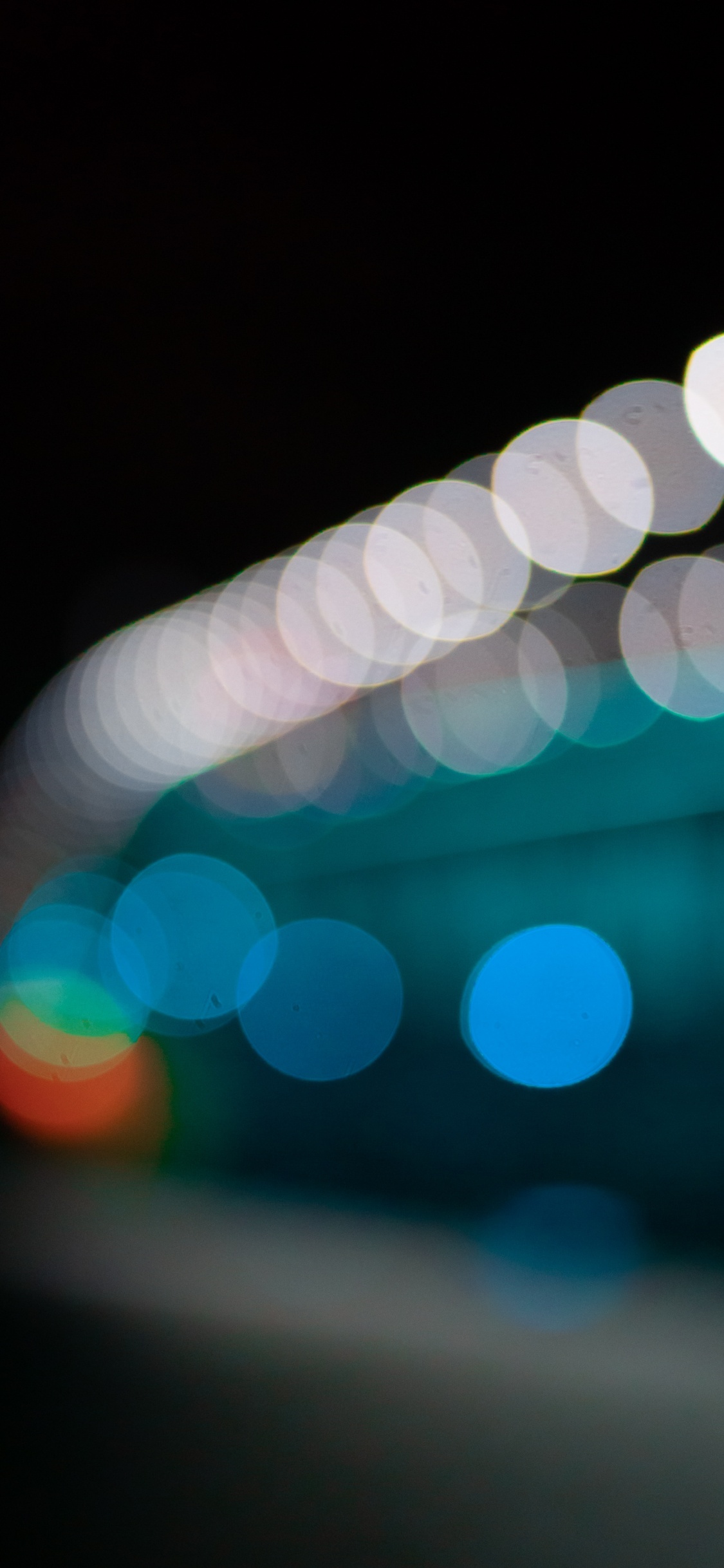 Grünes Und Weißes Licht-Bokeh. Wallpaper in 1125x2436 Resolution